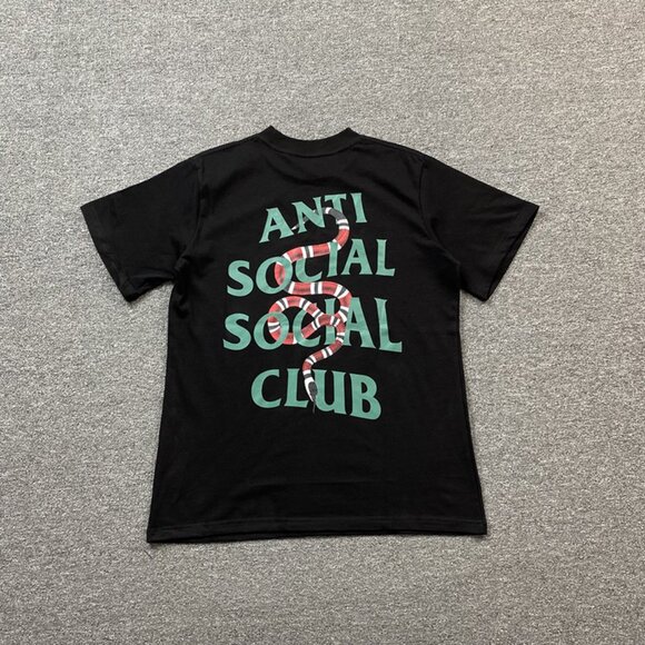 Anti Social Social Club Black T Shirt With Green Lettering And Snake Pattern